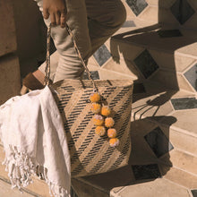 Load image into Gallery viewer, Borneo Sani Stripes Straw Tote Bag - with Marigold Tiered Pom-poms